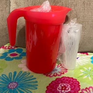 New red Tupperware pitcher with infuser.